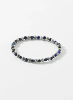 Black bead and grooved cross bracelet