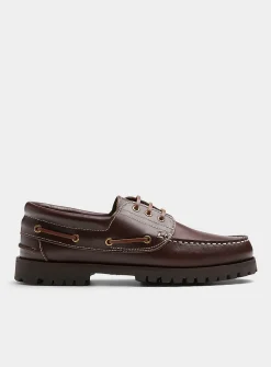 Brown leather notched boat shoes