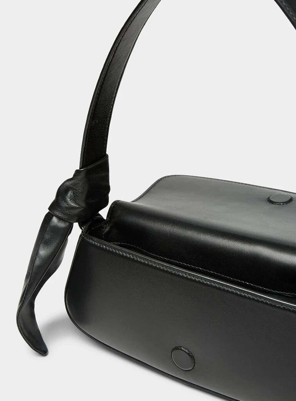Buckled leather baguette bag