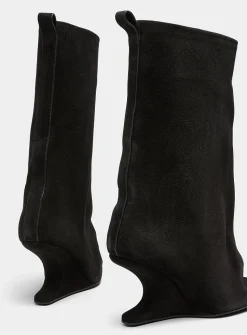 Cantilever heel flared suede boots