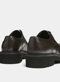 Chunky notched sole leather brogue shoes