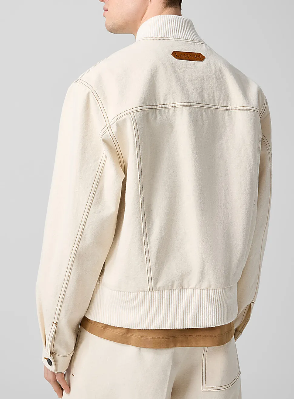 Contrasting stitching ivory bomber