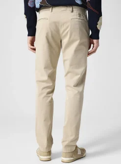 Cream-coloured tapered chino pant