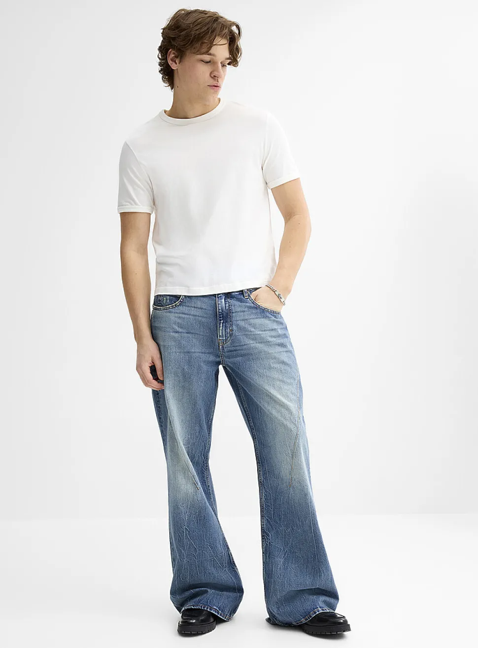 Diagonal seam faded-blue jean