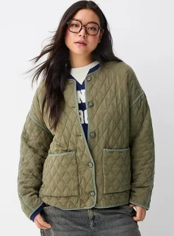Diamond pattern piped quilted jacket