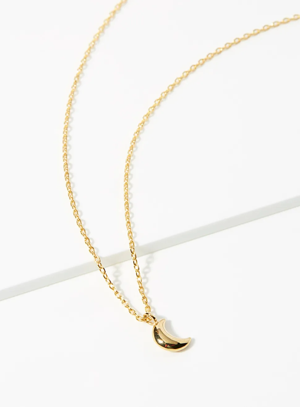 Domed moon necklace