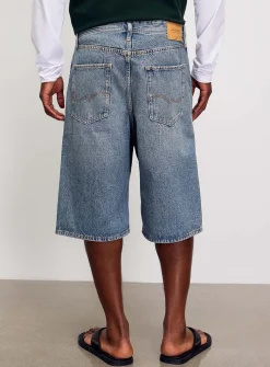 Faded blue denim loose Bermudas