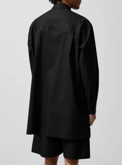 Fishnet inserts multipocketed elongated shirt
