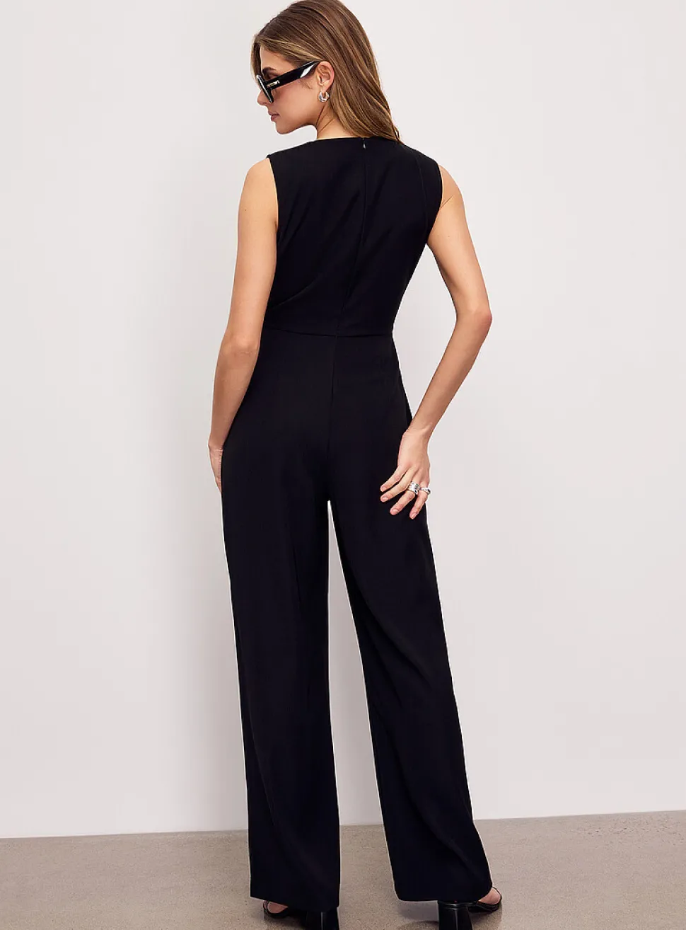 Flowy belted sleeveless jumpsuit