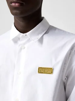 Golden logo plate shirt