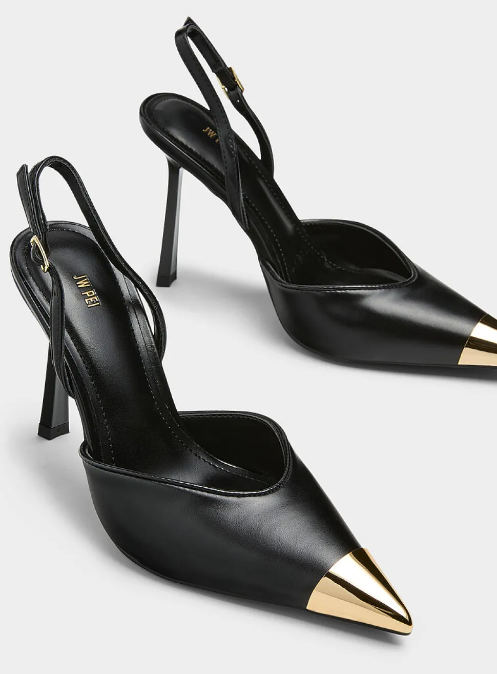 Gold pointed-toe slingback pumps
