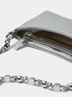 Le Petit Bisou chrome handbag