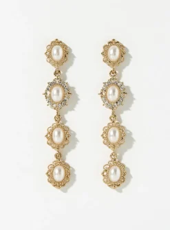 Long ornamental pearl earrings