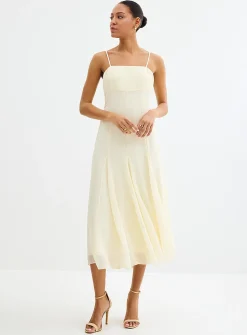 Long vanilla white flowy dress with cape