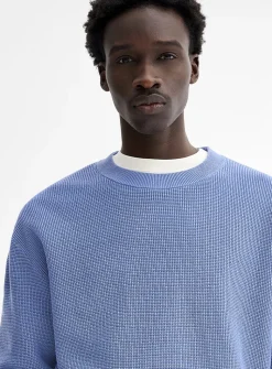 Loose waffle-knit sweater