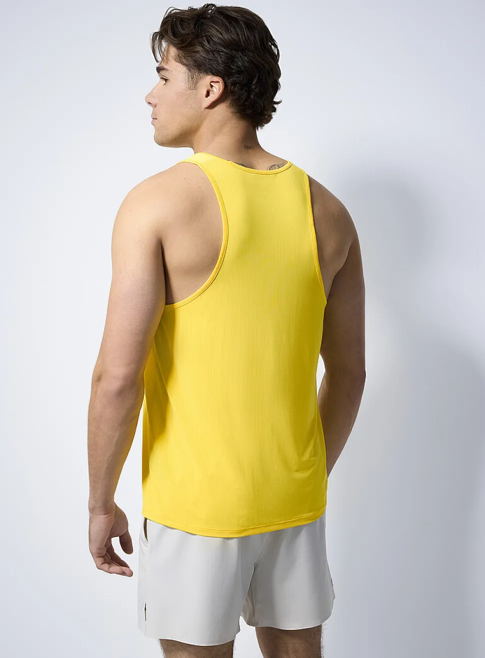 Low armhole micro-perforated tank