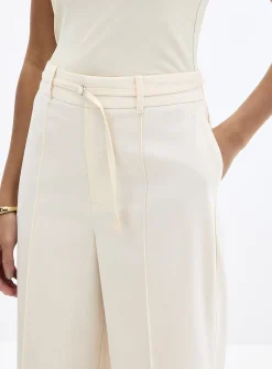 Moderne belted pintuck seam pant