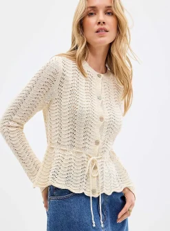 Openwork peplum cardigan with tie detail