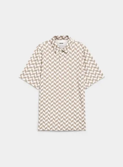 Patterned textured golf polo
