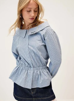 Peplum waist boat-neck shirt