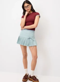 Pin dot pleated miniskirt
