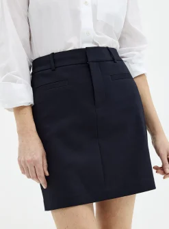 Piped pockets structured skort