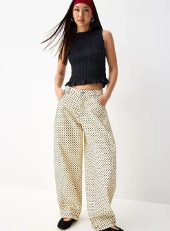 Polka-dotted barrel-leg jean