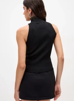 Polka-dotted mock-neck zip-up sweater vest
