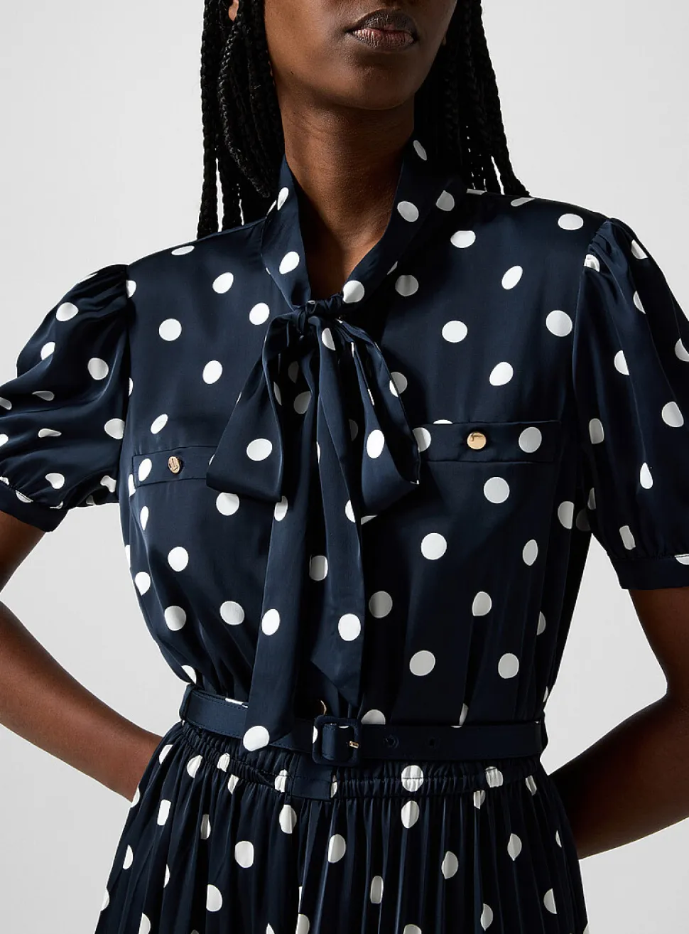 Polka-dotted tie-neck dress