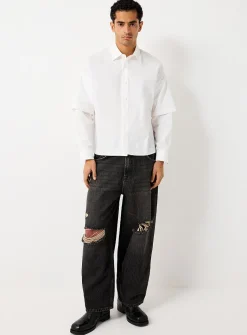 Ripped-knee jean