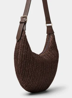 Rounded woven straw hobo bag
