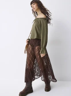 Ruffled off-the-shoulder blouse
