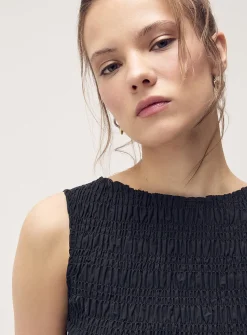 Ruffled trim smocked cami