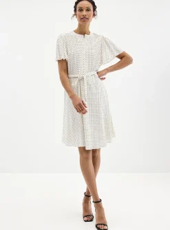 Silky polka dot pleated bib dress