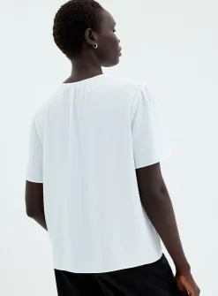 Slit-collar flowy crepe blouse