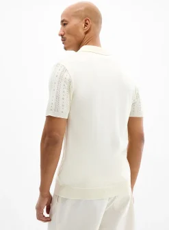 Striped pointelle-knit zip polo
