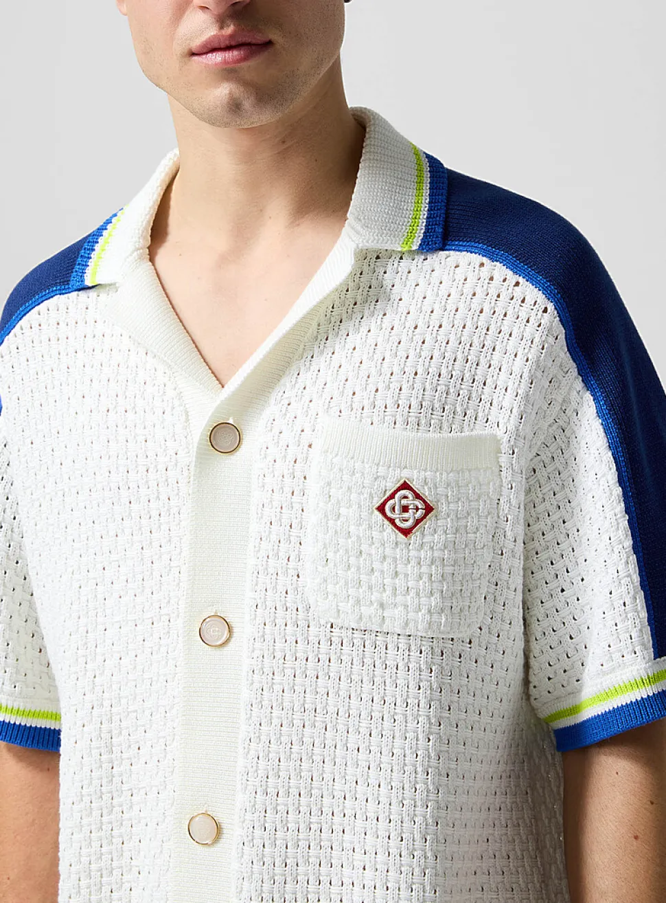 Striped trim crocheted knit shirt