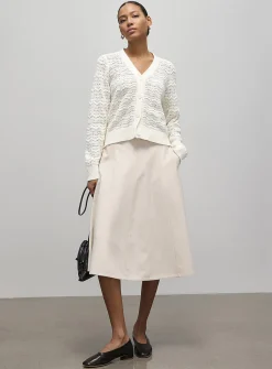 Waves and pompons textured cardigan