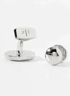 White mother-of-pearl cuff links and shirt buttons