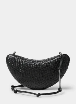 Woven leather crescent clutch